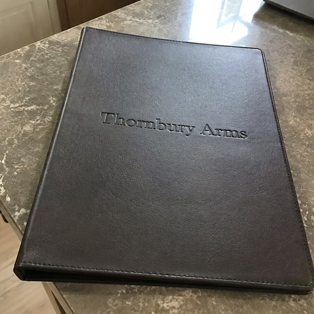 Custom menu covers — customer photo